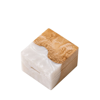 Square artisan wedding ring box made of pearl epoxy resin and natural burl wood.