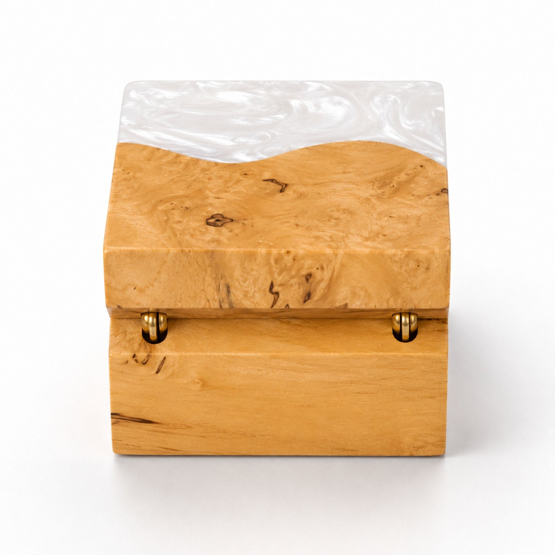 Hinge side back view of a square handcrafted ring box made of pearl resin and natural burl wood.