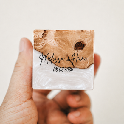 Custom engraved artisan ring box made of pearl epoxy resin and wood, showcasing a personalized name and date engraving
