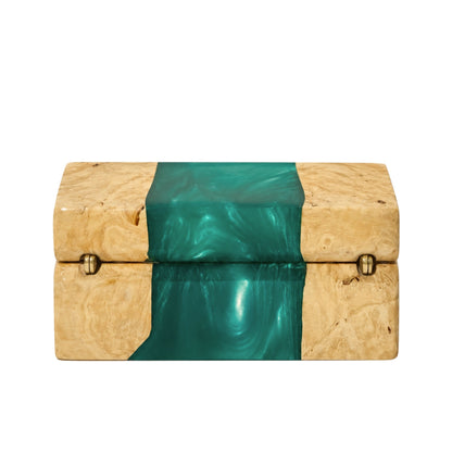 Back view of a closed wood and turquoise epoxy resin ring box showing the gold metal hinges and natural wood grain texture.
