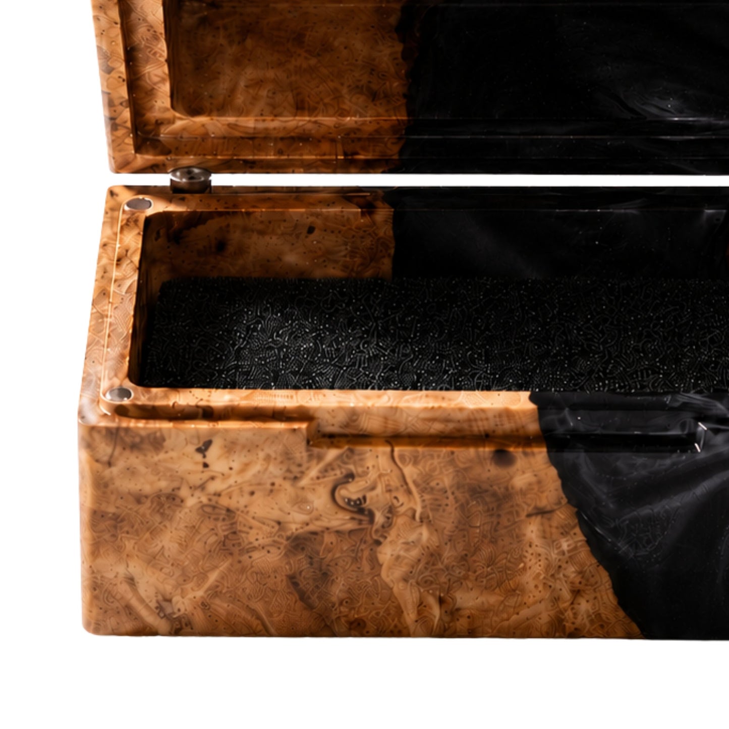 Close-up shot of an engagement ring cushioned inside an open burl wood and black epoxy resin ring box.
