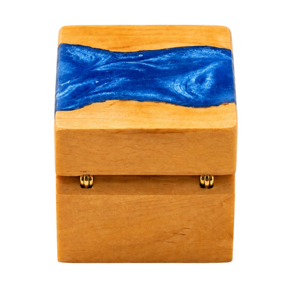 Closed view of a handcrafted wood and deep blue resin ring box showcasing the back of the resin ring box