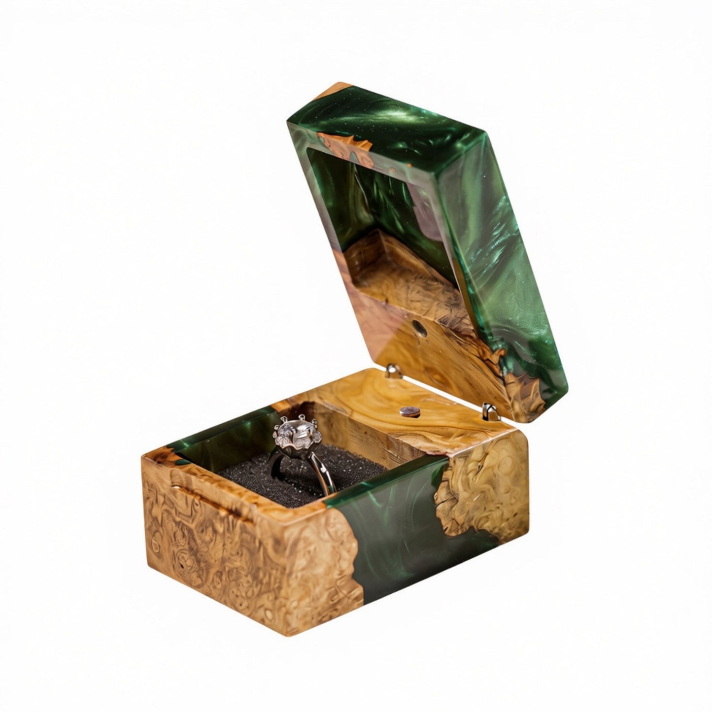 Open green epoxy resin and natural burl wood ring box holding a diamond engagement ring in a black foam slot.