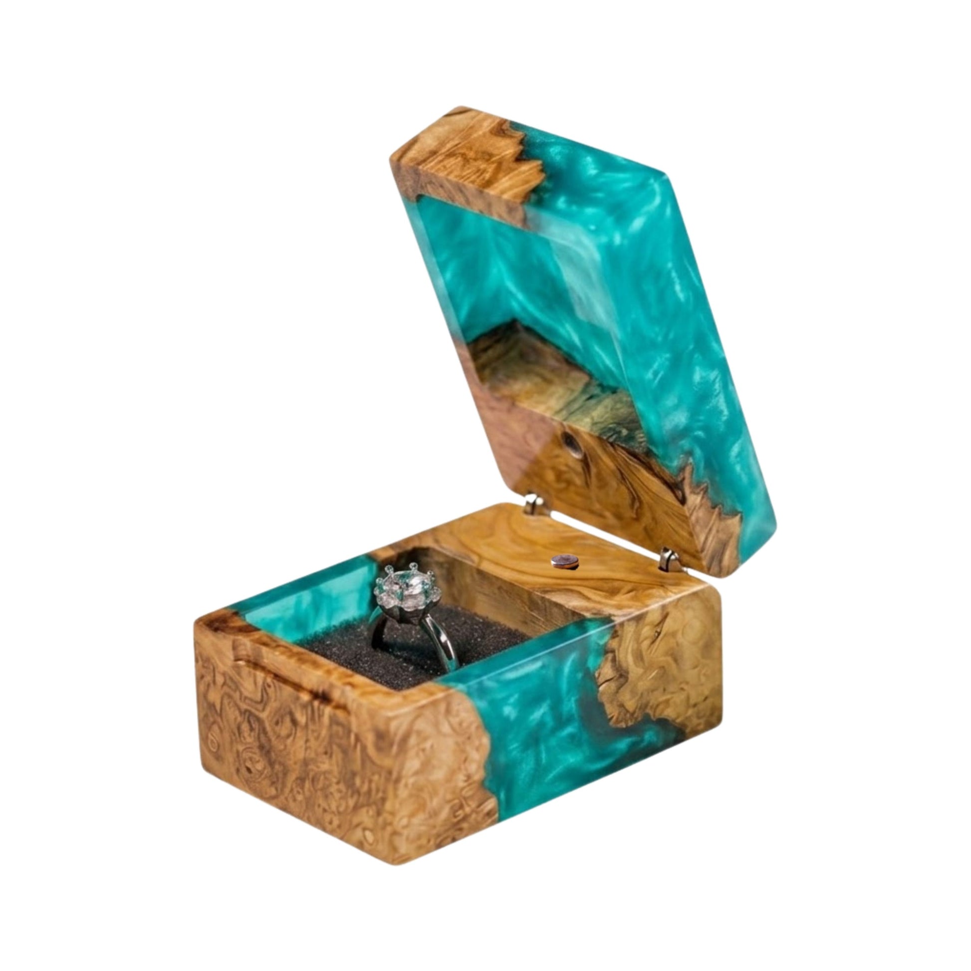 Open turquoise epoxy resin and natural wood ring box holding a diamond engagement ring in a black foam slot.
