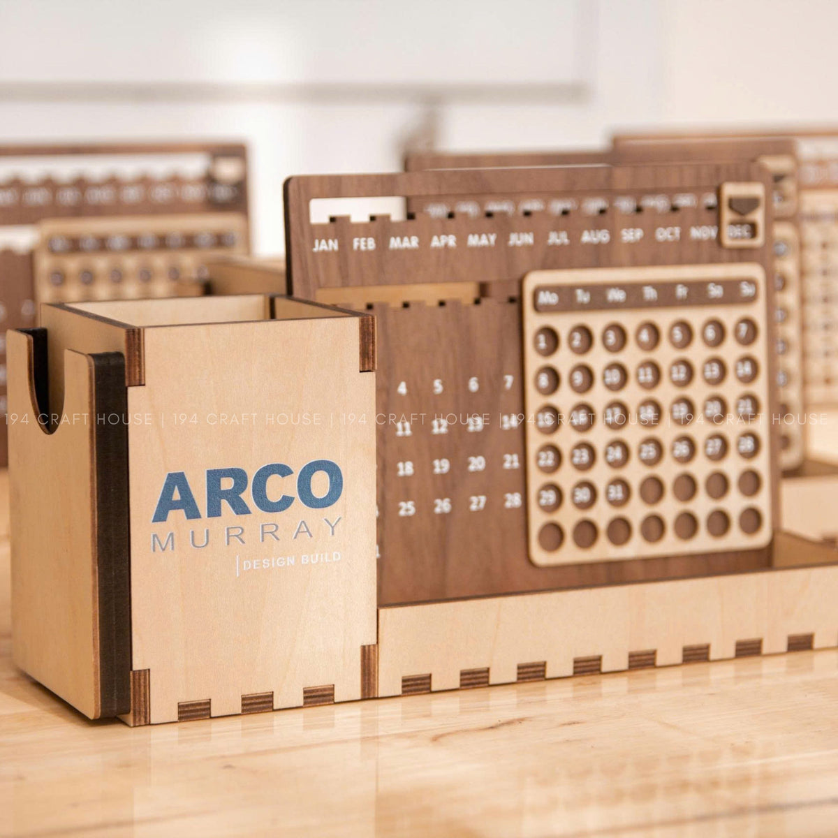 Wooden perpetual desk calendar - Personalize with custom engraving of your company logo for corporate gifts for employees and partners.