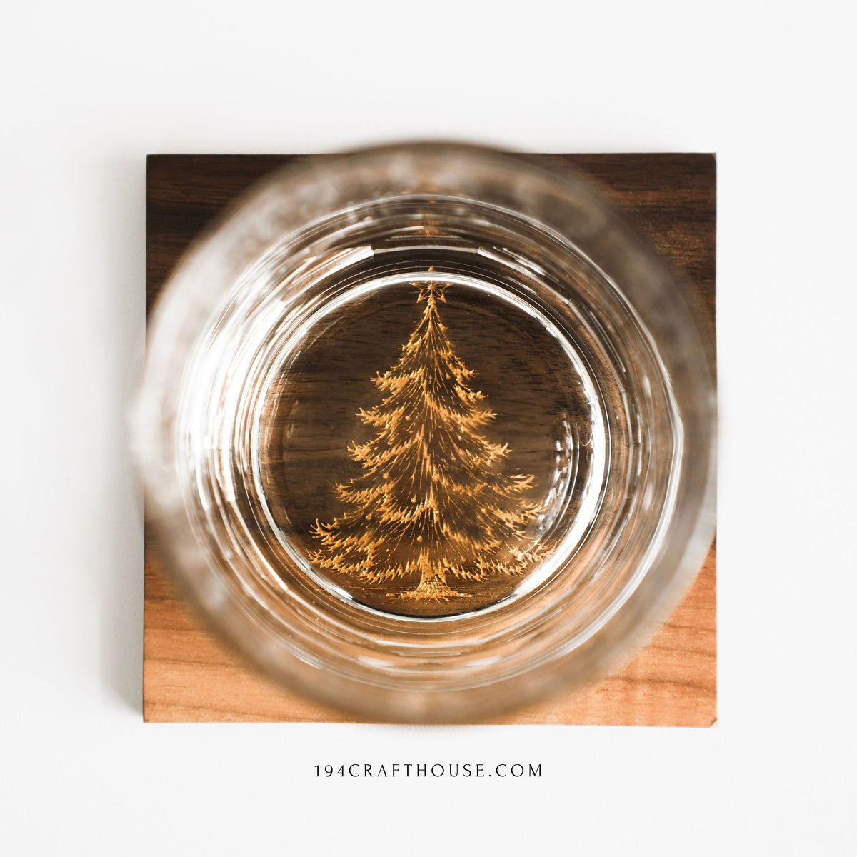 Walnut wood coaster, 10 by 10 centimeters, with gold Christmas tree engraving, handmade in Vietnam