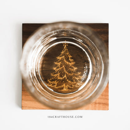 Walnut wood coaster, 10 by 10 centimeters, with gold Christmas tree engraving, handmade in Vietnam