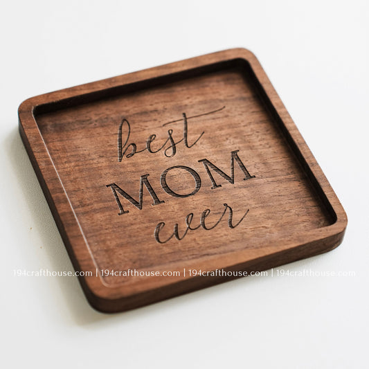 Close-up of a Best Mom Ever engraved square walnut wood coaster with