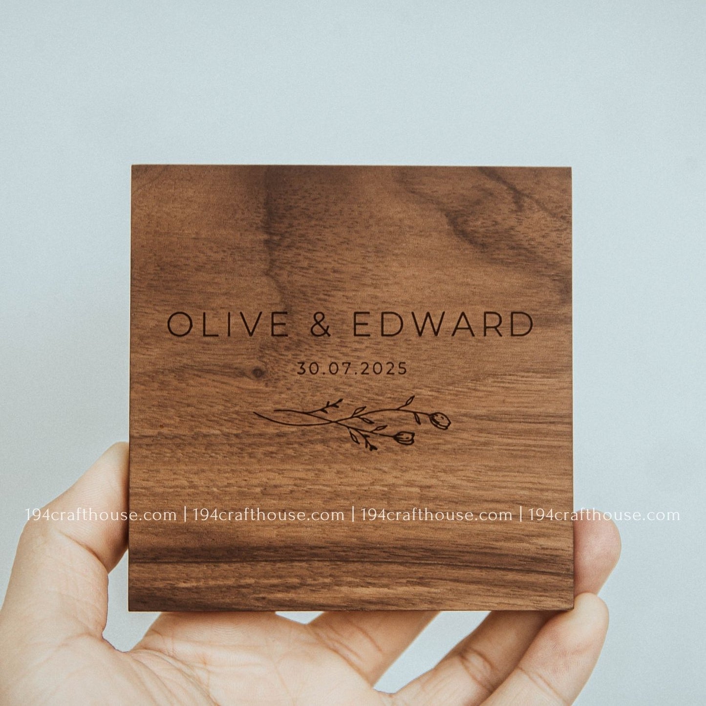 Handcrafted square walnut wood coaster with smooth rounded corners and rich natural wood grain