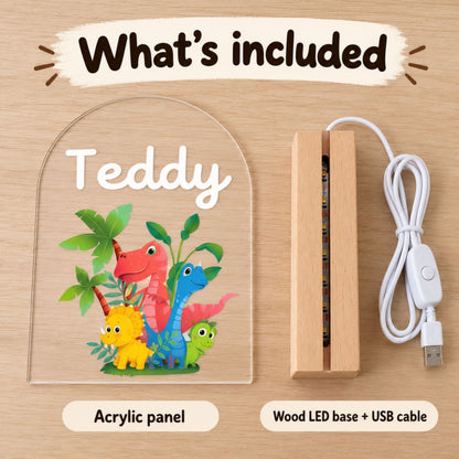 Graphic displays the acrylic panel, wood LED base, and USB cable beside the dinosaur design