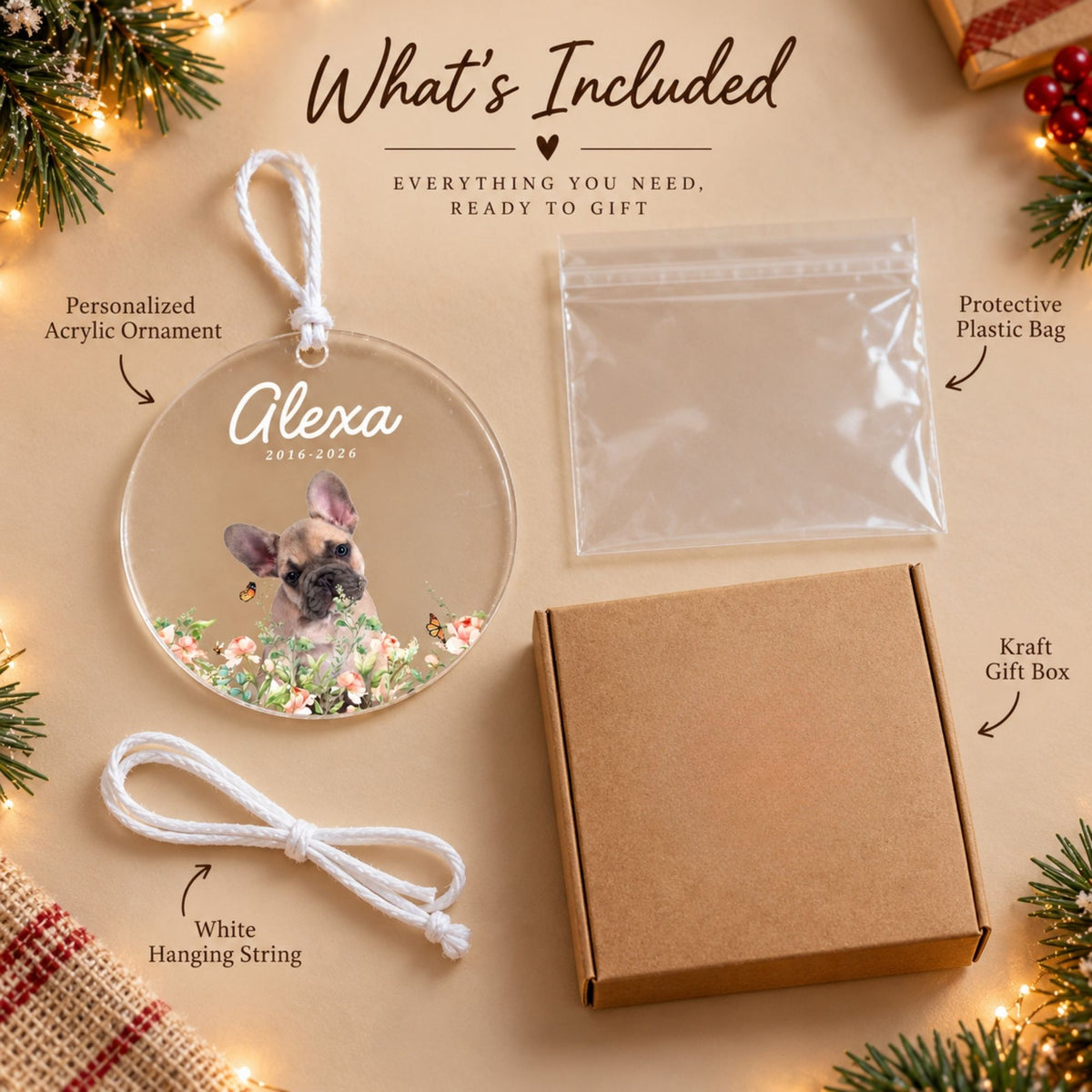 Component breakdown showing the custom acrylic pet ornament, white hanging cord, protective plastic sleeve, and kraft gift box on a holiday background.
