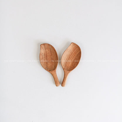 Pair of small handcrafted leaf-shaped wooden scoops for spices, coffee, tea, and dry ingredients