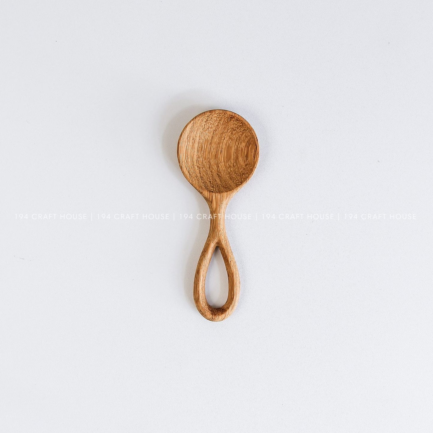 Handmade small wooden scoop for coffee, tea, spices, sugar, and dry ingredients with natural wood grain