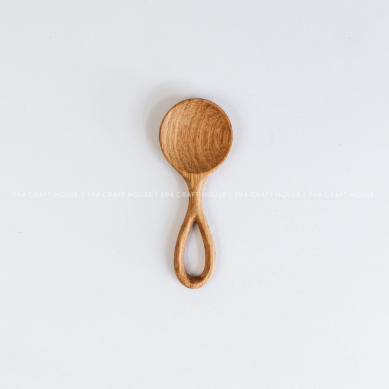 Handmade small wooden scoop for coffee, tea, spices, sugar, and dry ingredients with natural wood grain