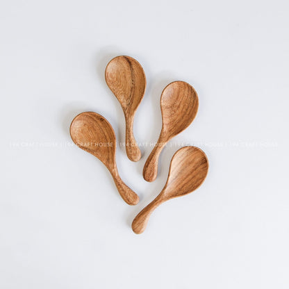 Collection of hand-carved wooden spoons with curved short handles for tea, coffee, spices, and serving