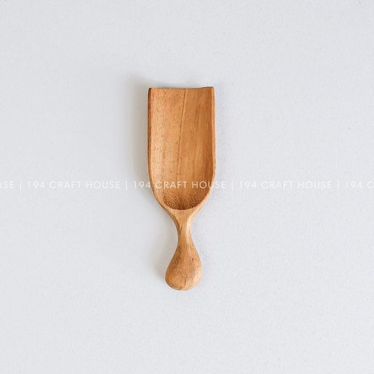 Handcrafted small wooden scoop made from Doussie wood for bath salts, spices, coffee, tea, and dry ingredients