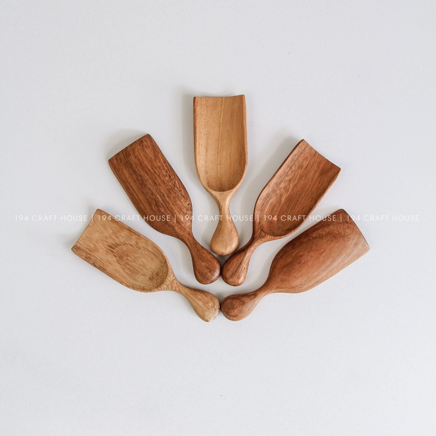 Collection of handcrafted small wooden scoops for bath salts, spices, coffee, tea, sugar, and dry ingredients