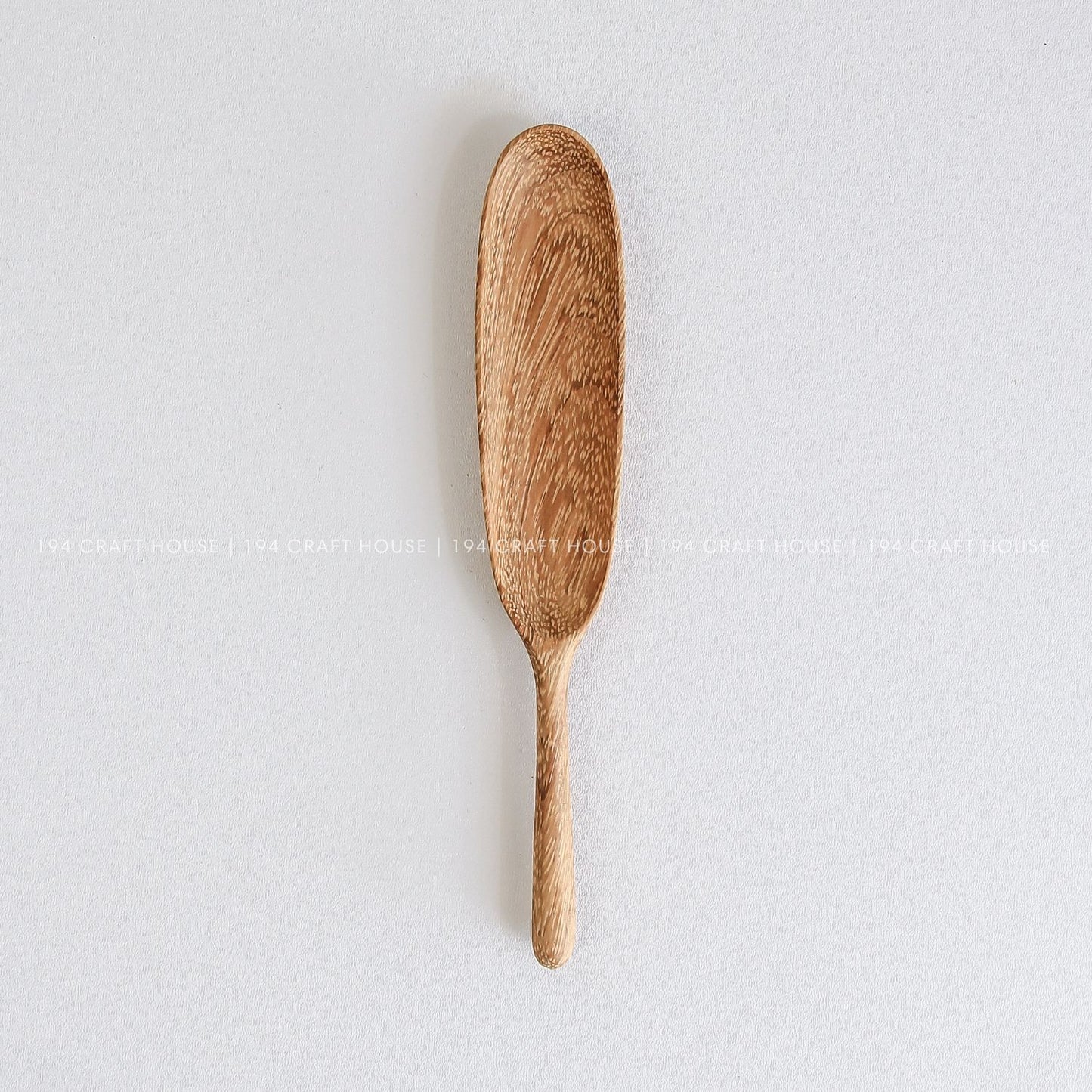 Handcrafted long-handle wooden measuring spoon for spices, herbs, coffee, tea, and dry ingredients with natural wood grain