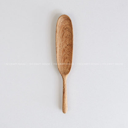 Handcrafted long-handle wooden measuring spoon for spices, herbs, coffee, tea, and dry ingredients with natural wood grain