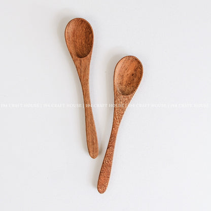 Two handcrafted wooden coffee and tea measuring spoons showcasing beautiful natural wood grain