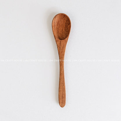 Handcrafted wooden coffee and tea measuring spoon with smooth finish and natural wood grain