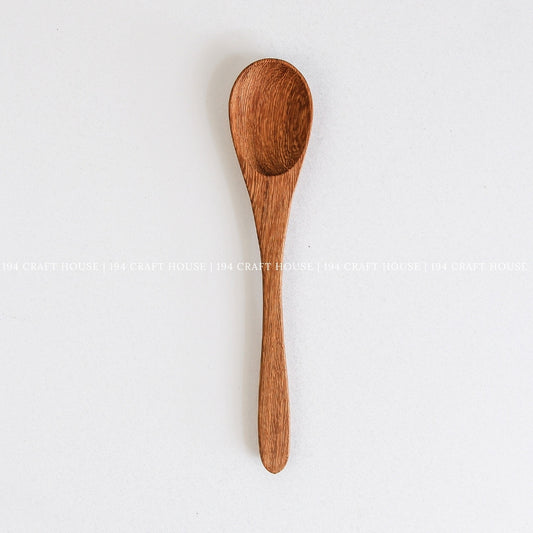 Handcrafted wooden coffee and tea measuring spoon with smooth finish and natural wood grain