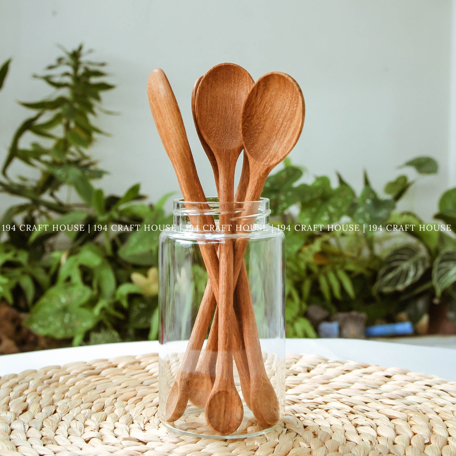 Double-ended wooden spoons displayed as handcrafted kitchen utensils