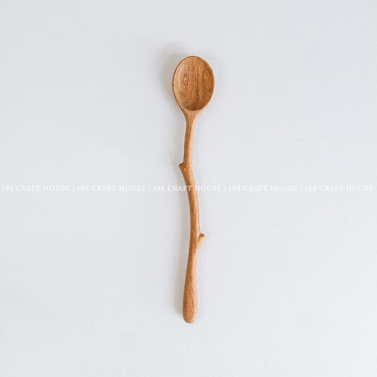 Handcrafted long-handled
Branch Tree Wooden Spoon with a smooth round bowl and a rustic on a clean white background.