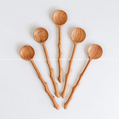 Assorted handcrafted branch tree wooden spoons for cooking, serving, and kitchen decor