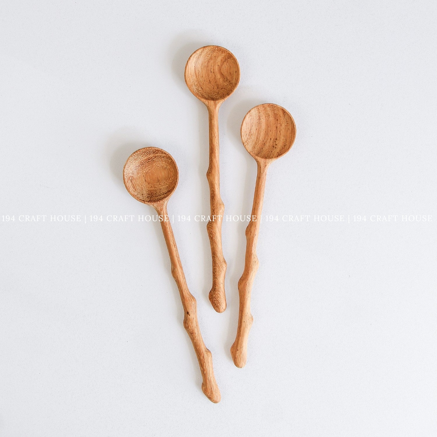 Handcrafted branch tree wooden spoons showcasing beautiful natural wood grain variations