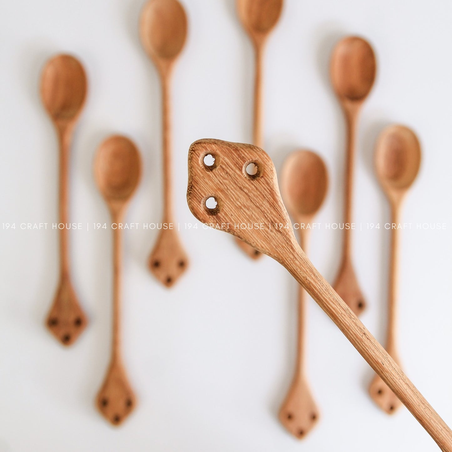 Assorted handcrafted vintage wooden spoons for cooking, serving, and kitchen decor