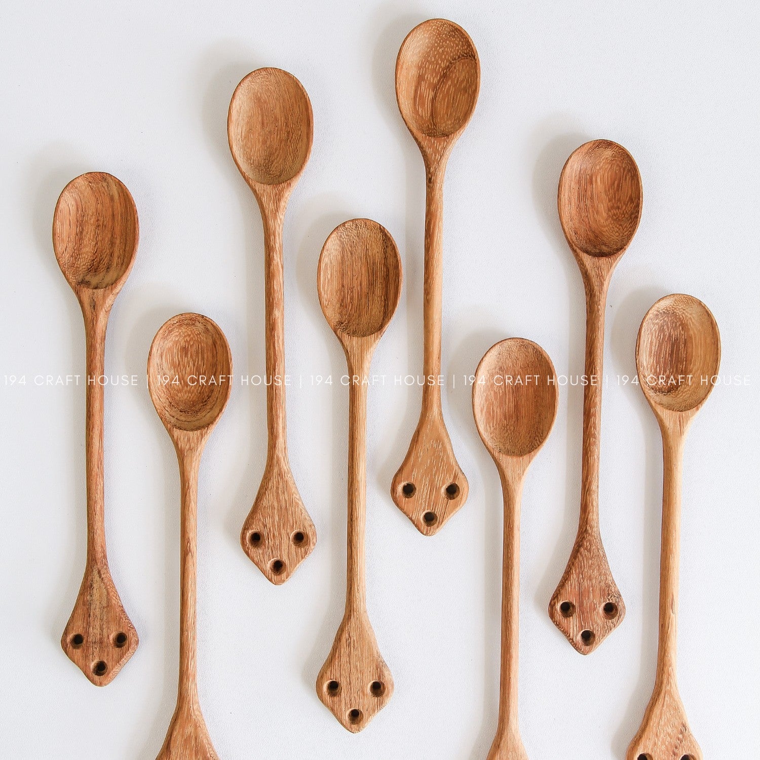 Collection of handcrafted vintage wooden spoons with elegant carved handles