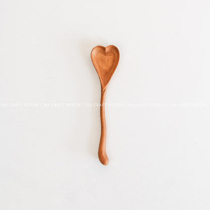 Handcrafted wooden heart-shaped spoon made from natural wood