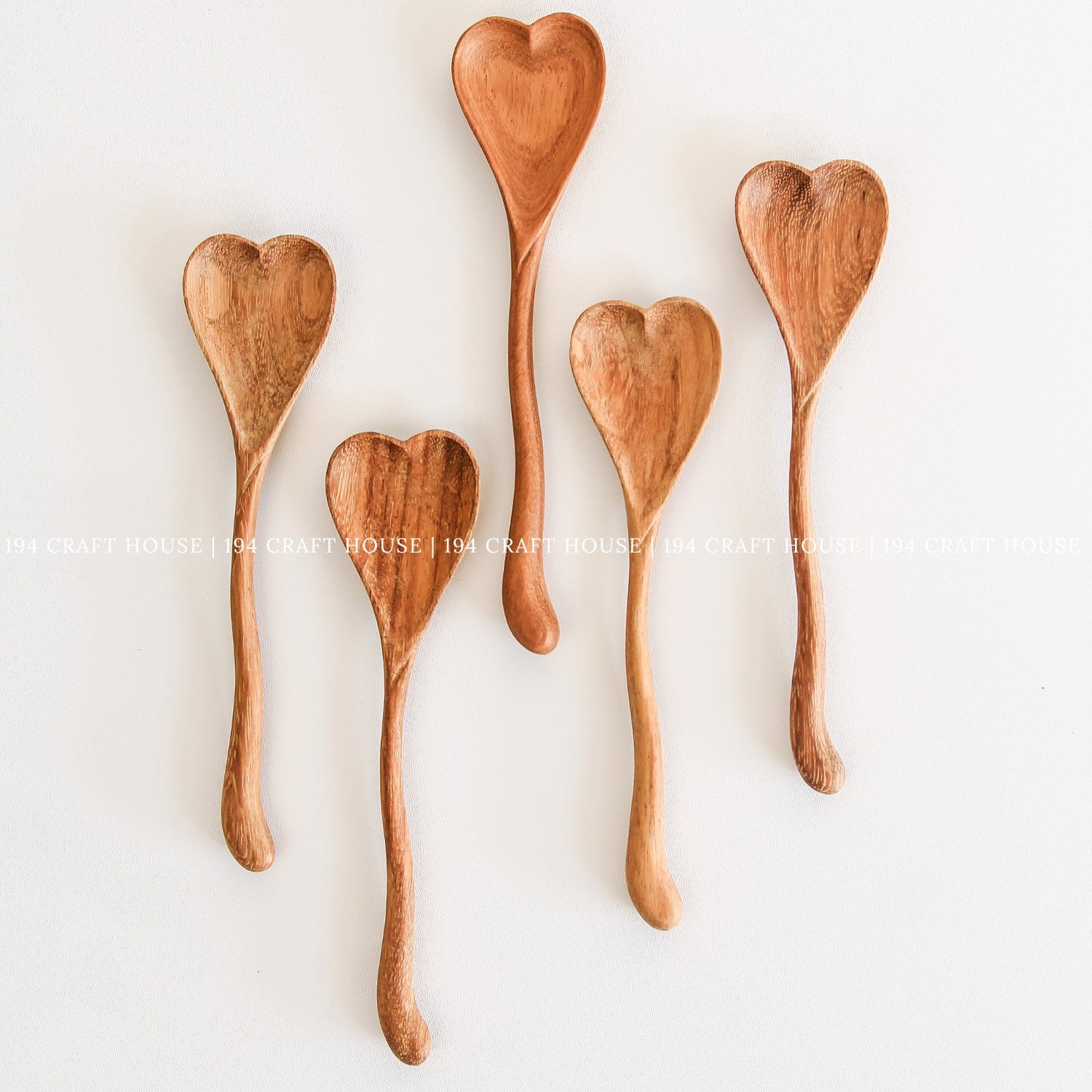 Set of handcrafted wooden heart spoons for kitchen use and personalized gifts