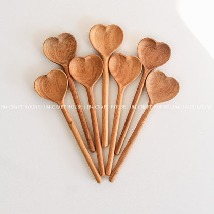 Collection of heart-shaped wooden spoons for personalized gifts and kitchen decor