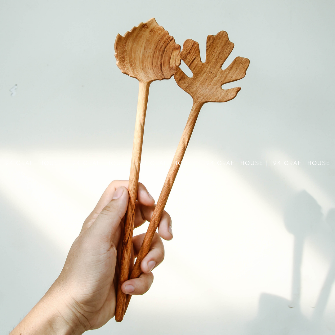 194 Craft House offers these handcarved wooden salad servers, a large-size spoon set designed for serving in the kitchen.