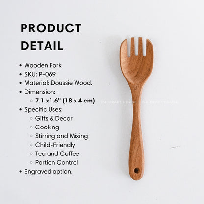 Wooden salad fork beside printed product details and listed uses