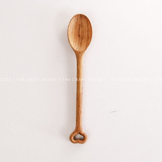 Handmade Doussie wood spoon with a heart handle by 194 Craft House, perfect for coffee, tea, and kitchen decor.