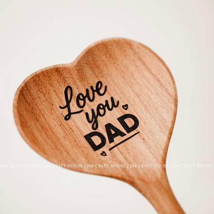 Engraved heart-shaped wooden spoon with Love You Dad message as a personalized gift for Dad