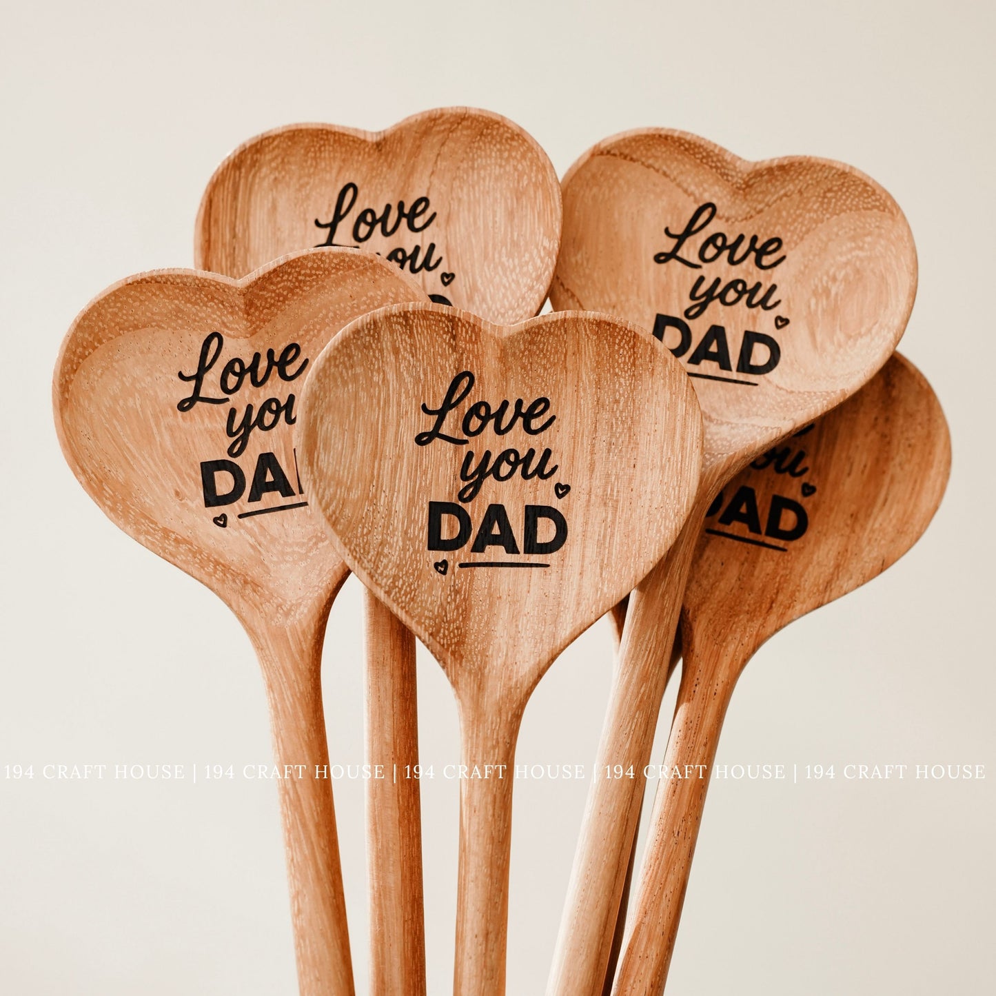 Set of heart-shaped wooden spoons with Love You Dad engraving for a handcrafted Father's Day gift