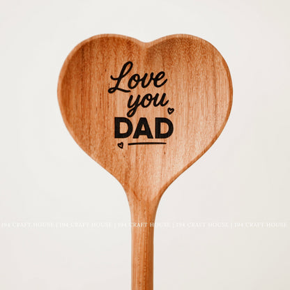 Heart-shaped wooden spoon engraved with Love You Dad as a handcrafted Father's Day gift