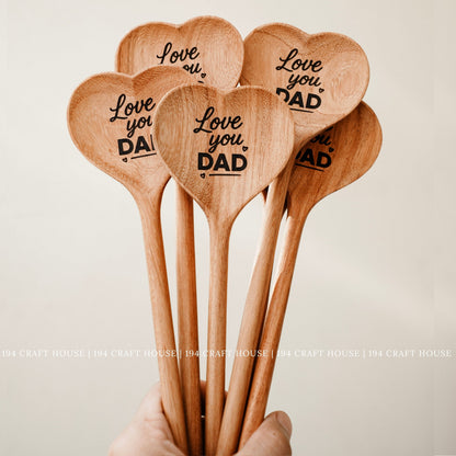 Collection of heart-shaped wooden spoons engraved with Love You Dad as personalized Father's Day gifts