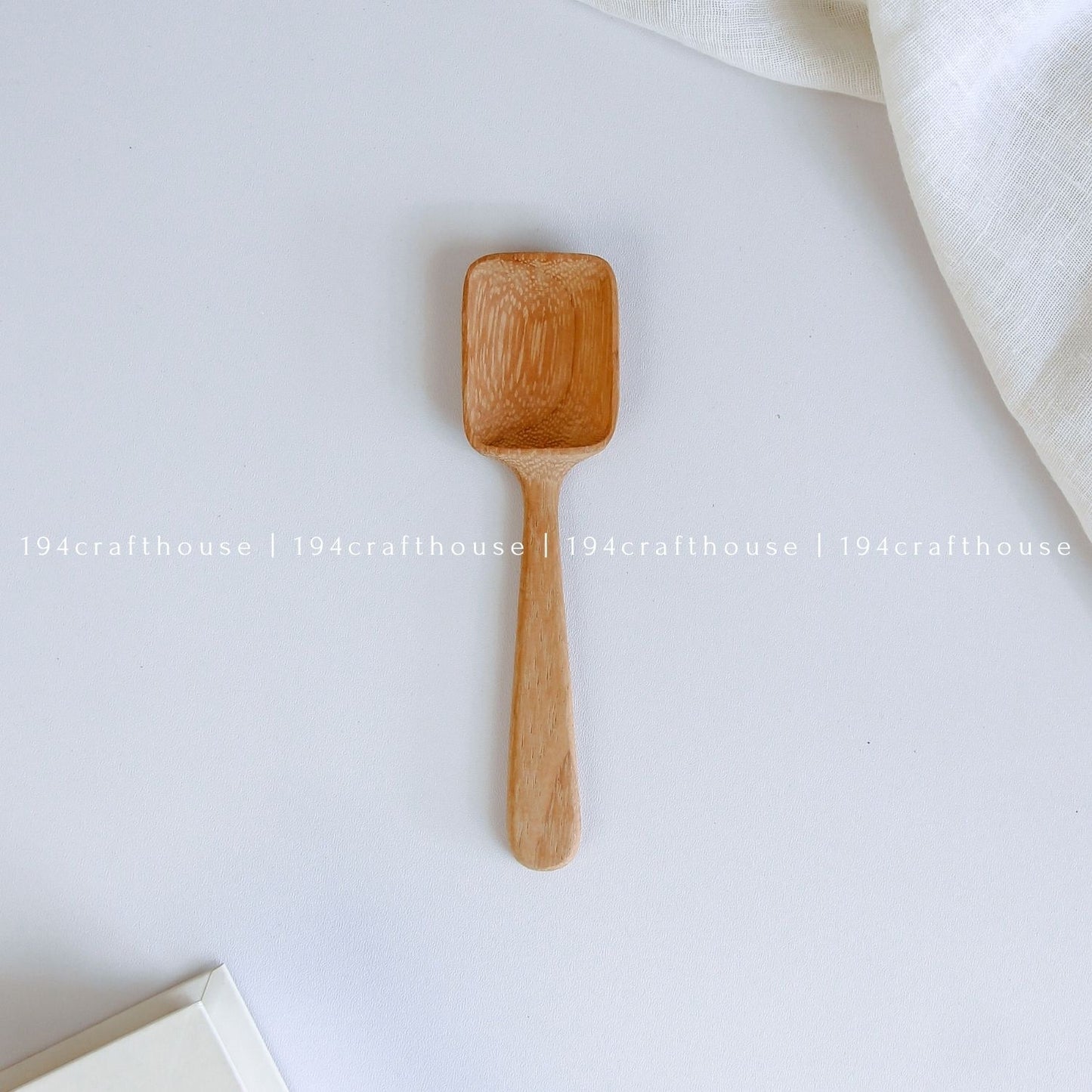 Single handcarved Doussie wood measuring spoon for coffee, tea, spices, and ingredients