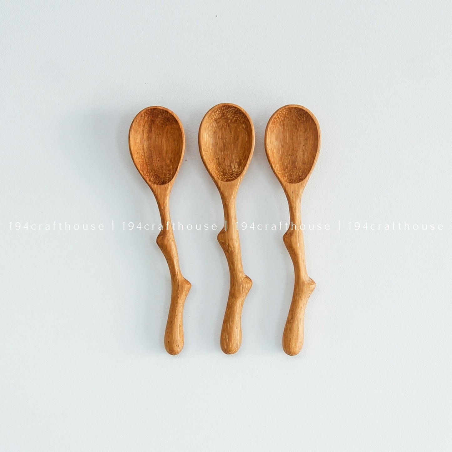 Set of three handcrafted twig handle wooden spice spoons