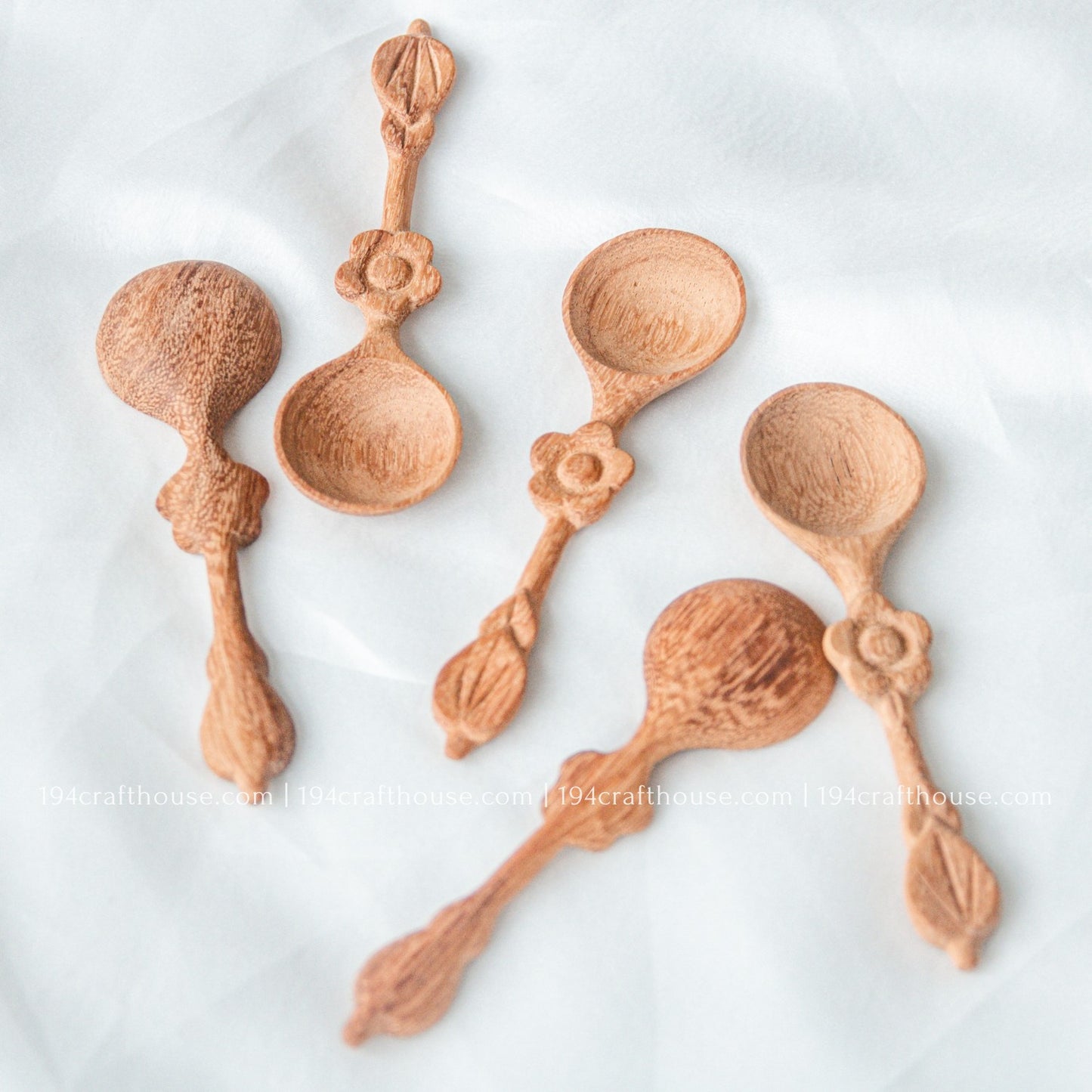 Collection of handcrafted flower-handle wooden spice spoons for coffee, tea, herbs, spices, and kitchen decor