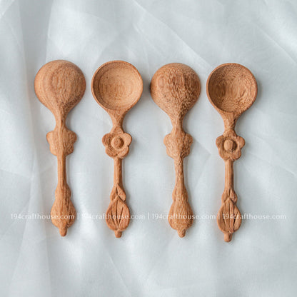 Set of five handcrafted flower-handle wooden spice spoons for measuring and serving small ingredients