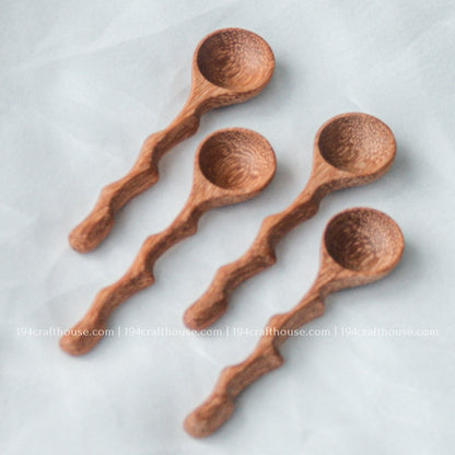 Handcrafted branch-tree wooden spice spoons showcasing smooth finishes and unique natural wood grain variations