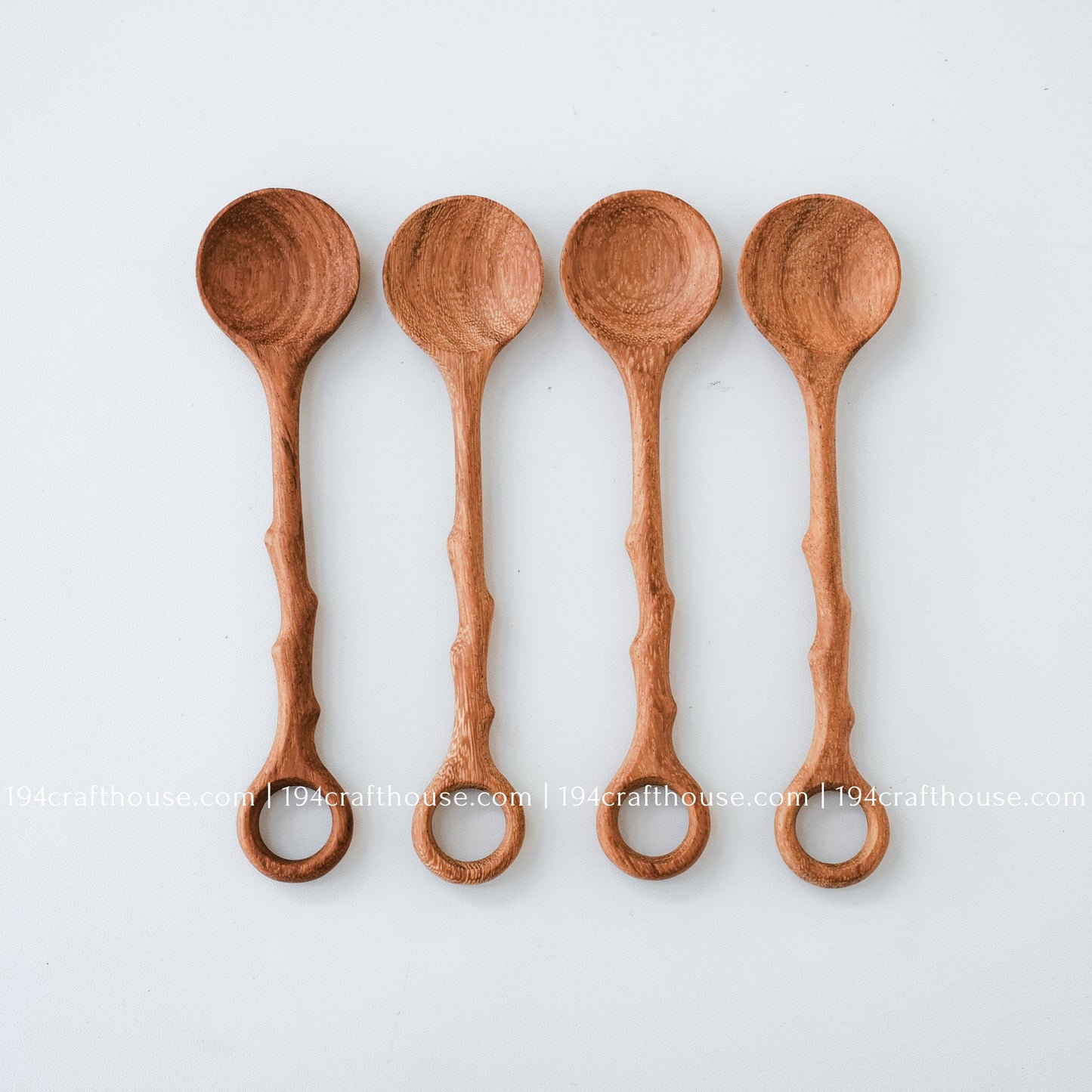 Set of four handcrafted branch-tree wooden coffee stirring spoons with natural wood grain