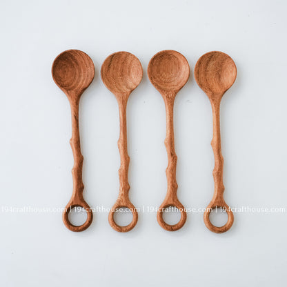 Set of four handcrafted branch-tree wooden coffee stirring spoons with natural wood grain