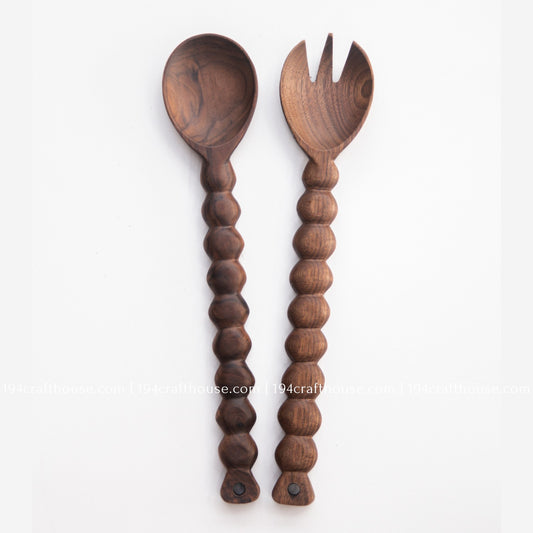 Handcrafted walnut wood salad servers with beaded handles, featuring a serving spoon and fork set on white background by 194 Craft House.